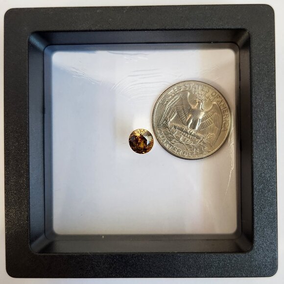 Sphene 7.18mm x 6.88mm x 4.30mm Oval 1.47ct Loose Gemstone - Picture 16 of 16